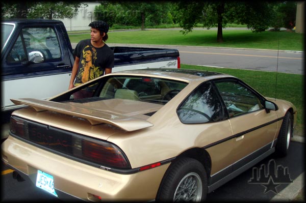 Miami Jackson looks right at home in this Fiero we