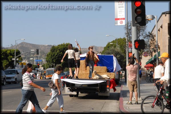 Dancing cowboys on a flatbed of hay
