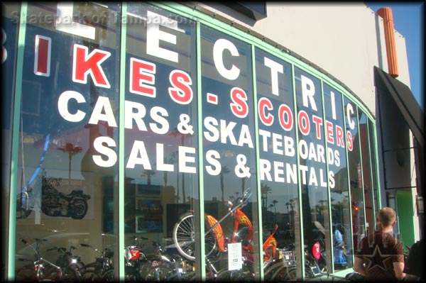 Cars and skateboards in the same store