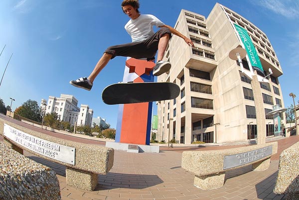 Dylan Perry ollies up and kickflips the gap