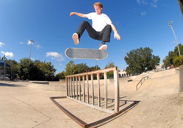 Pat Stiener about to catch a kickflip over it